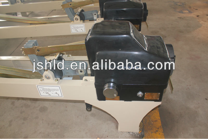 coconut fiber cam shedding device for water jet loom