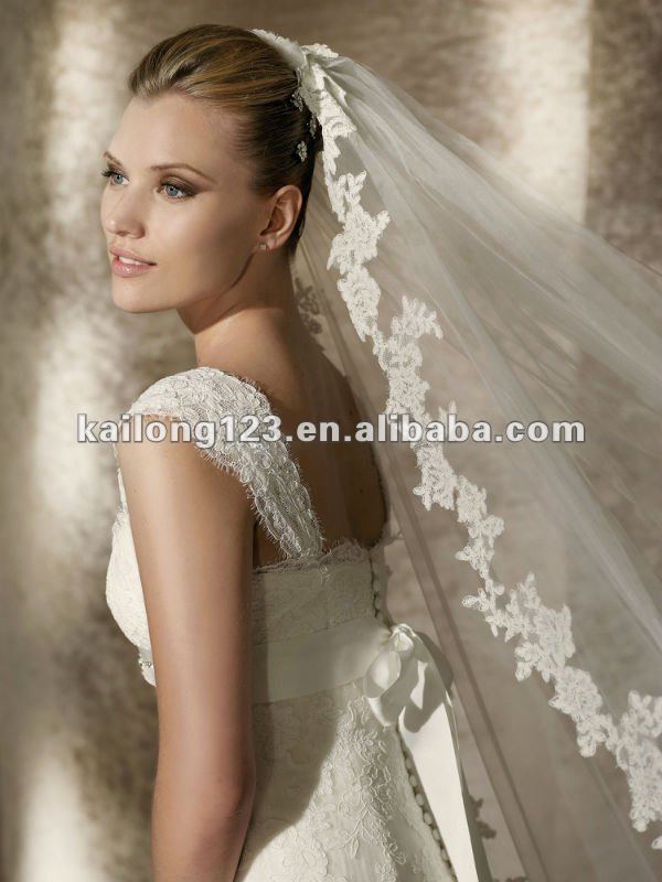 Lace and tulle full aline gown with scalloped neckline and cap sleeves