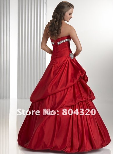 Three tiered bubble hem ballgown featuring a band of dazzling jewels and 