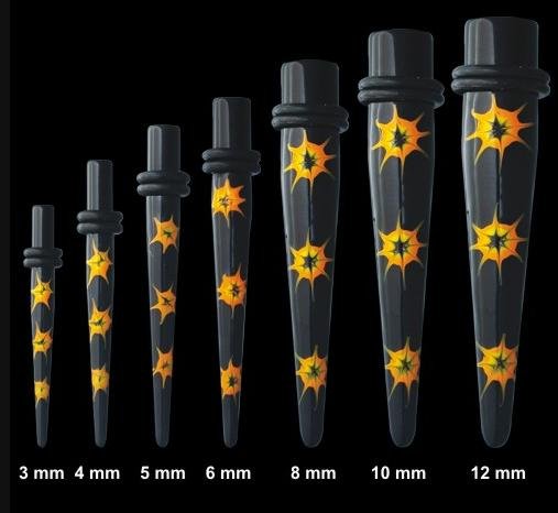 6mm ear stretcher. 3mm ear stretcher.