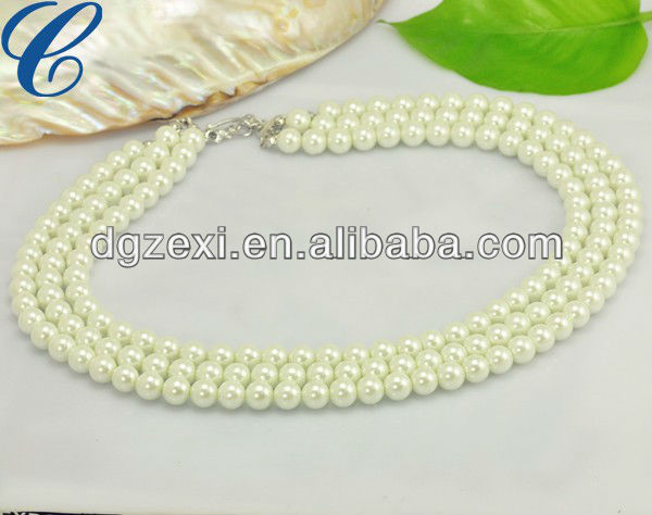 Vintage Triple Strand Pearl Necklace.jpg