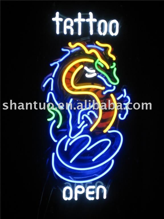 neon tattoo sign. union electric tattoo neon sign at night