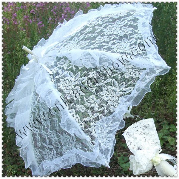 Wedding decoration as white lace umbrella