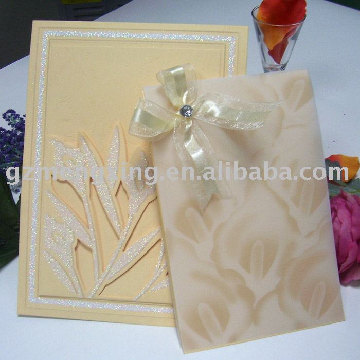 Wedding invitation card with fancy bow into a special rose sharp envelope