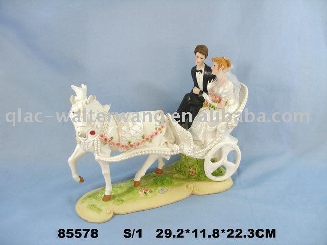 Polyresin wedding couples on carriage