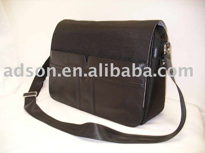 Leather Messenger Bag. Nylon/leather messenger bag