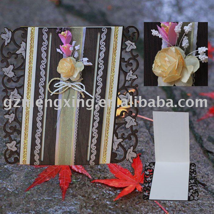 Wooden wedding invitation card with beautiful roses and lovely grape leaves