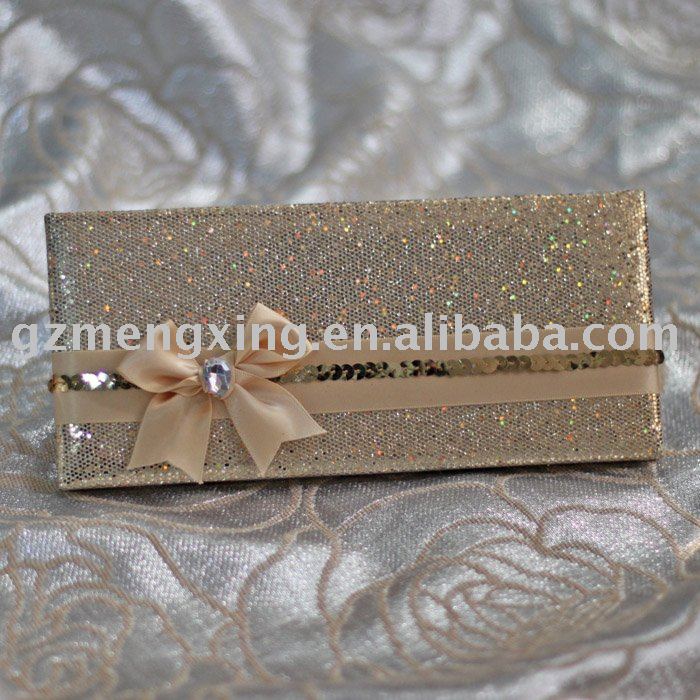 Wedding invitation card with shining appearance tied with a nice diamend