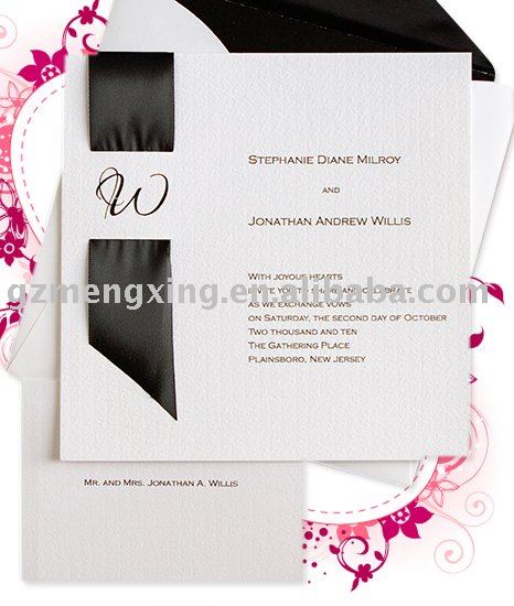 Wedding invitation card with an pretty ribbon and matching envelope and RSVP