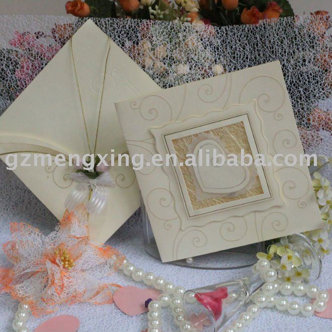 wedding invitation card with a cute heart on a creative envelope adding 