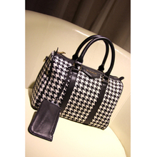 The new plover case barrel bag handbag portable inclined shoulder bag