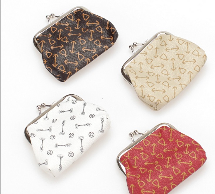 Free shipping the new fashion PU ossicle zero wallet button bag miniature handbags