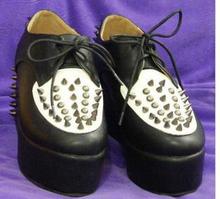 Spring new European and American punk style rivet element wind hedgehog shoes shoes flat shoes stepped on anti- wolf
