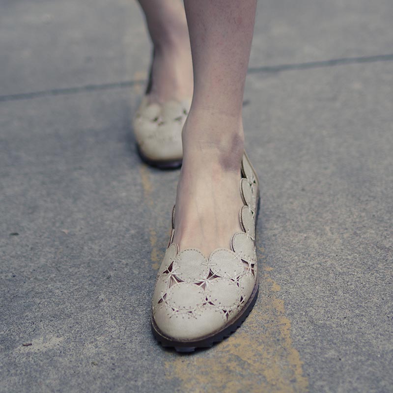 Free shipping 2014 sweet new shoes hollow leather shoes women flat heel pad casual shoes shallow