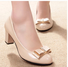 2014 spring and autumn low women’s bow shoes with single shoes thick heel wedges pumps.