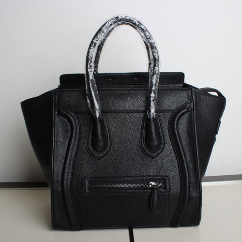 Moti 2014 new wave of female bag of mixed colors embarrassed smiley bag laptop large European