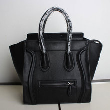 Moti 2014 new wave of female bag of mixed colors embarrassed smiley bag laptop large European and American high-quality 024