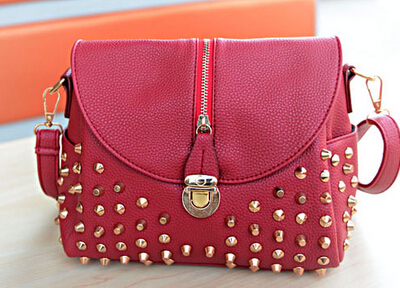 The new leisure bag shoulder bag temperament fashion handbags bucket clamshell zipper rivets Messenger Bag