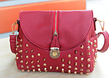 The new leisure bag shoulder bag temperament fashion handbags bucket clamshell zipper rivets Messenger Bag