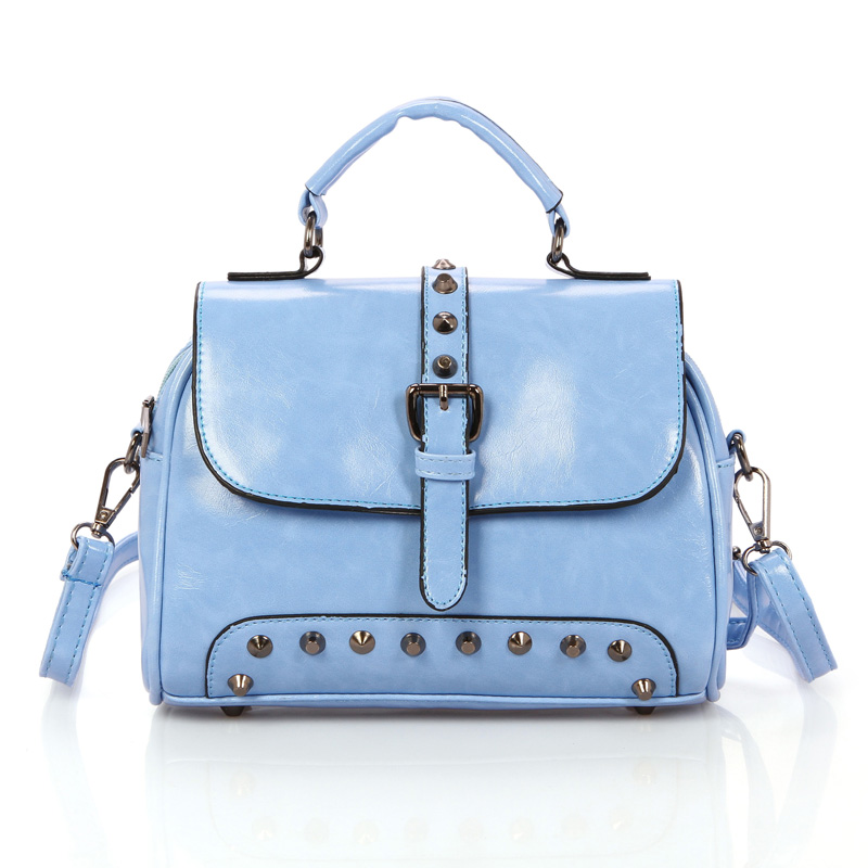 2014 The new sell like hot cakes women s handbag fashion personality rivet handbag messenger bag