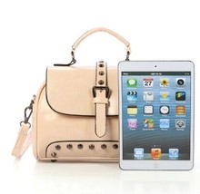 2014 The new sell like hot cakes women s handbag fashion personality rivet handbag messenger bag