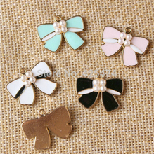 Free shipping 50pcs lot 23 19mm mix colors gold color plated drop oil jewelry knot bows