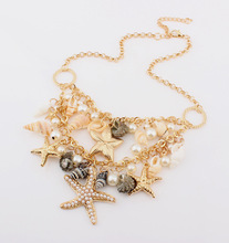 Korean choker of the lovely pearl sea shell double star sweater chain necklace gold ladies statement