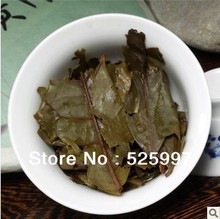 Yunnan Seven tea cakesCai zhe puer tea 357g raw tea Pu er tea in gold leaf