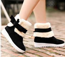 Free shipping The 2014 winter snow boots warm bow increased women’s boots size 34-42.