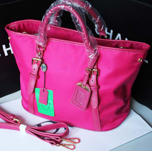 The popular P nylon cloth with leather fashion handbag across Europe and the United States handbags large capacity