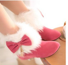 Free shipping:The new winter 2014 female boots sweet bowknot flat boots