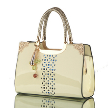 Russia Style women Hollow out leather handbag tote crossbody bolsas Women Genuine patent messenger bag pendant