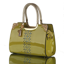 Russia Style women Hollow out leather handbag tote crossbody bolsas Women Genuine patent messenger bag pendant