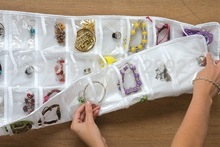 Good hangable organizer transparent nonwoven fabric PVC double sides hanging jewelry storage bag 72 pockets jewelry