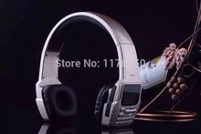 Newest Amazing Unique Luxury stereo headphone mobile phone Unlocked GSM quad band cell Phone support FM