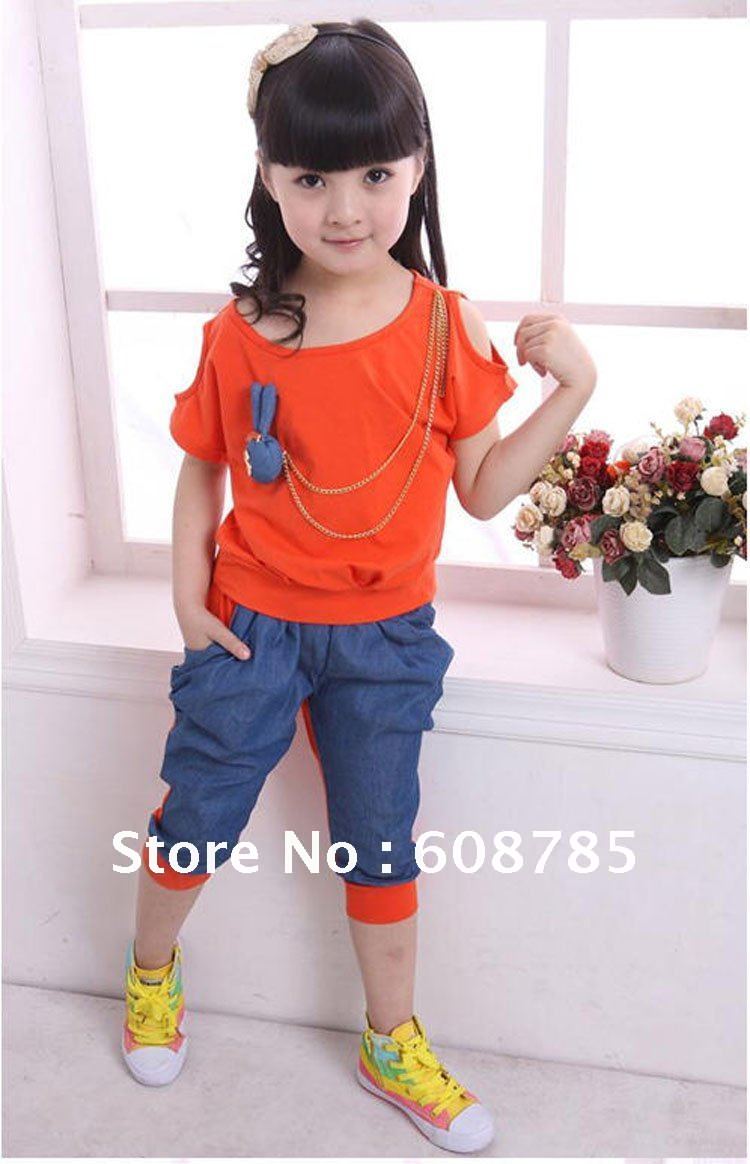 http://i01.i.aliimg.com/wsphoto/v0/592304595_1/Free-shipping-2012-Korean-version-of-the-new-girls-short-sleeved-pants-suits-denim-stitching-sportswear.jpg