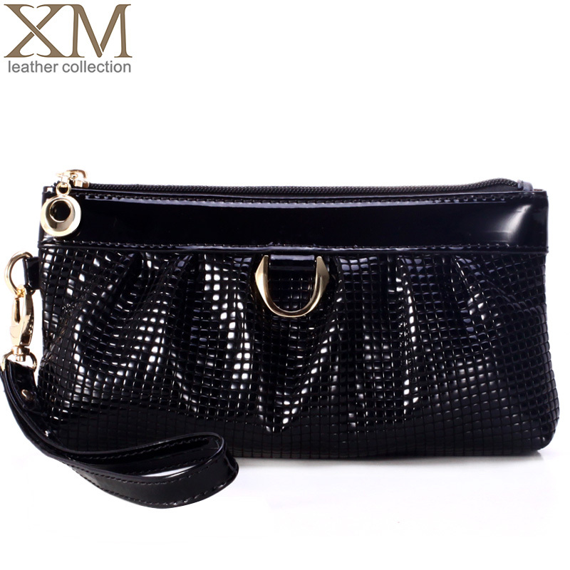 2014 women s handbag japanned leather clutch women s cowhide day clutch bag women handbag q31