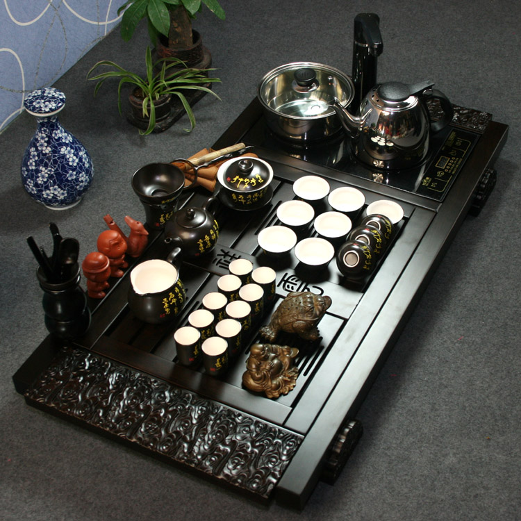 Ebony wood tea tray set black ceramic kung fu tea set electromagnetic furnace solid wood tea