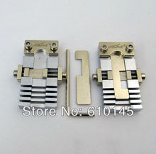 a pair vertical key chucking tools for special key.key clamp for car and special hard key cutting.