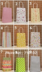 free shipping 21cm*13cm*8cm small environmental protection kraft paper gift bag for gift or clothes(China (Mainland))