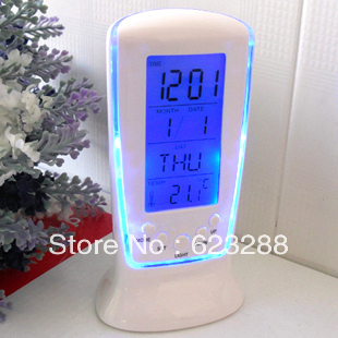 Led electronic watch lounged luminous quieten calendar thermometer alarm clock(China (Mainland))