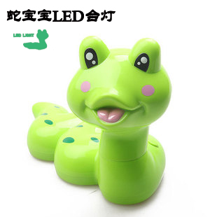 Rotate the snake zodiac cartoon led table lamp bed-lighting reading light student lamp child gift(China (Mainland))