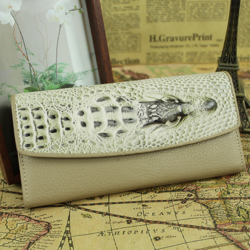 Embossed brief personality genuine leather female wallet long design genuine leather female wallet 100% women's leather casual(China (Mainland))