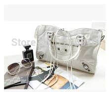 2014 women s handbag fashion tassel Medium handbag motorcycle bag messenger bag