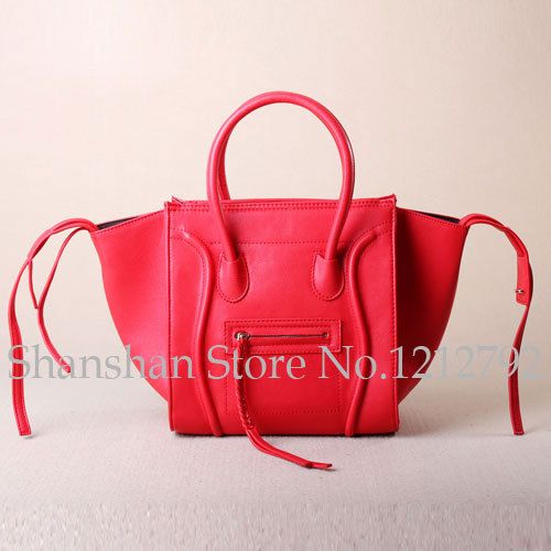Free shipping 2015 red phantom smiley package high quality famous brand fashion bats bag women tassel