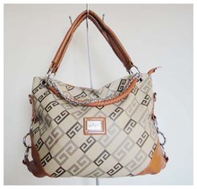 Hot sale wowen’s unique bag,PU,Size:40 x 28cm,two different colors(khaki),Two function(handbag / messenger bag),Free shipping
