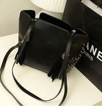 fashion design 2014 paragraph bags female skull rivet smile bag tassel chain bag fashion all match
