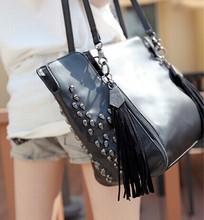 fashion design 2014 paragraph bags female skull rivet smile bag tassel chain bag fashion all match