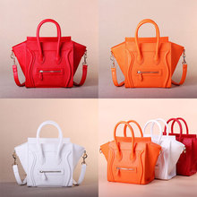 2014 new fashion Cross pattern Handbag smiley bag Fluorescence color Hot luggage line bag Small Tricolor