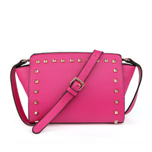 wholesale 2014 summer new shoulder diagonal cross pattern ear rivet package